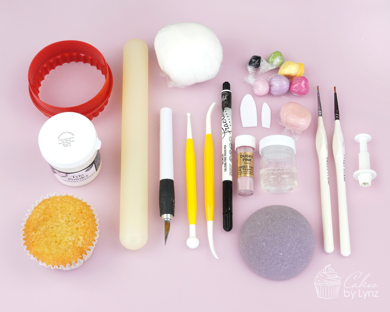 cake decorating tools to create a fondant bunny cake topper